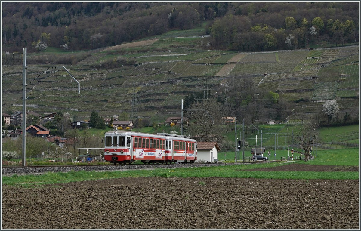 Der ex  Birsigtalbahn-Zug  bestehnd aus Bt 134 und BDe 4/4 als AOMC Regionalzug bei Villy. 
7. April 2016