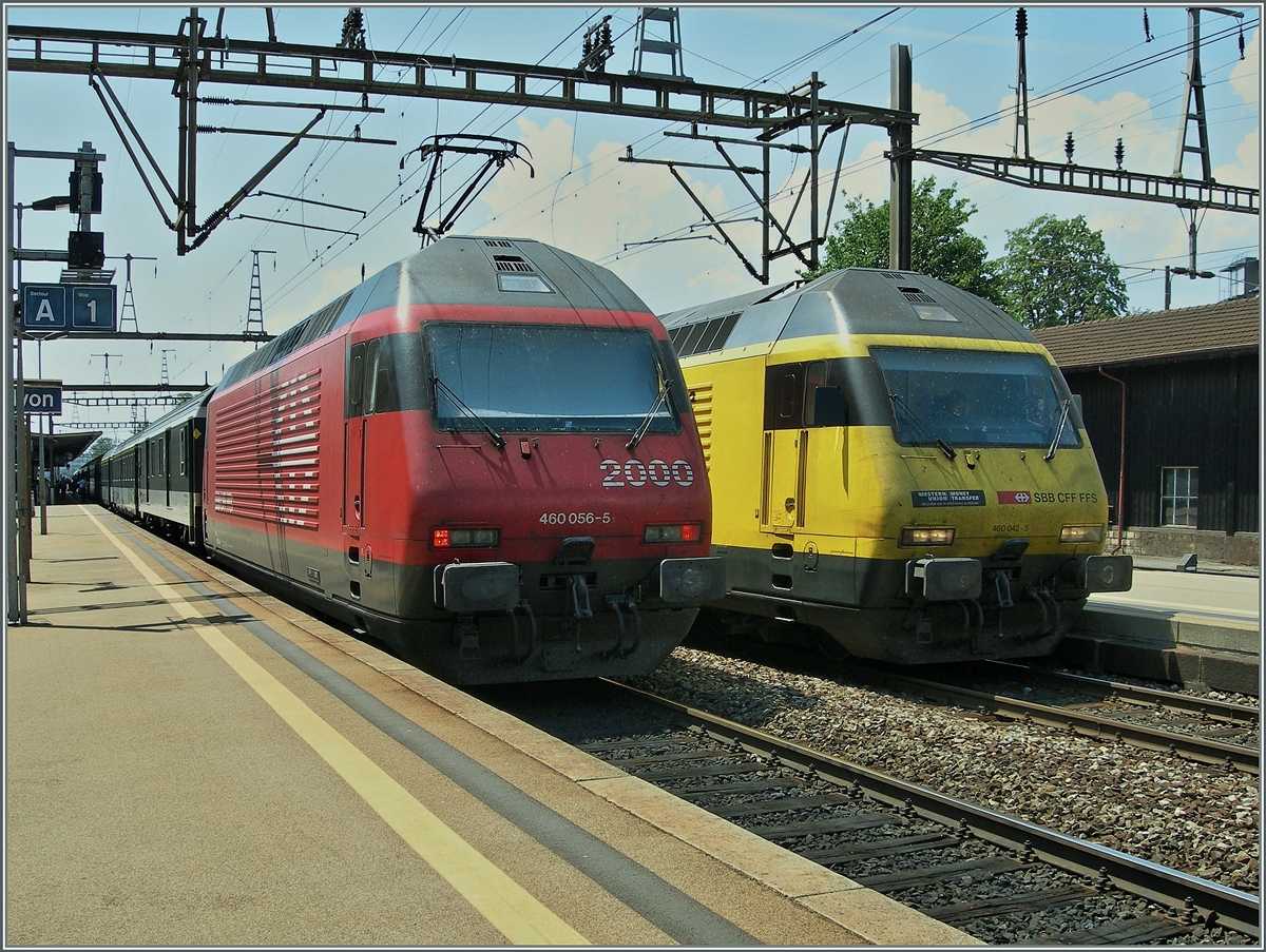 Die SBB Re 460 056-5 und 042-5 mit IR Zügen in Nyon.
25. Juli 2006