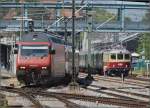 Oldistunden im Grenzbahnhof. 

Und Schweizerstunde... Re 4/4 I 10034 mit ihrem Sonderzug Augsburg-Basel nebst Re 460 005-1 im Bahnhof Konstanz. Juni 2014.