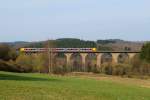 Ein fnfteiliger Stadler Flirt der Hessischen Landesbahn berquert am 28.03.2014 den Ruderdorfer Viadukt zwischen Siegen und Dillenburg.