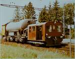 Ein SBB Tm II ist mit den  Unkrautvertillgungszug  in Mellingen unterwegs. 

8. Juli 1982
