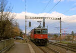 Ausfahrt einer S-Bahn S19 aus Dietlikon Richtung Effretikon - Winterthur, zuhinterst die Re420 230. 6.Februar 2023   