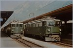 Die RhB Ge 4/4 I 601 und Ge 6/6 II 706 gem. meinen Aufzeichnungen mit Regional- und Schnellzügen Richtung Albula am 20. August 1984 in Chur.