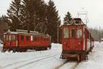 NStCM: ABDe 4/4 5 und Regionalzug mit ABDe 4/4 11 in St-Cergue im Dezember 1984.