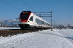 SBB: Regionalzug nach Biel mit dem RABe 523 049 bei Niederbipp am 21. Januar 2016.
Foto: Walter Ruetsch