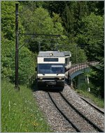 Ein MVR  Be 2/6 als MOB Regionalzug 2333 Les Avants - Montreux kurz vor Sendy Sollard.
25. Mai 2016
