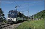 Die MOB GDe 4/4 6005 mit dem PE 2122 von Montreux nach Zweisimmen bei Sonzier. 
Nach langen verkehrte der Zug nicht nur mit vier Wagen in fast  normaler  Länge, sondern auch wieder mit Lok und Komposition. 
09. Mai 2020