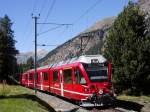 Zwischen den Bahnhöfen Surovas und Morteratsch ist R 1637 von St. Moritz kommend am 19.08.2012 unterwegs nach Tirano.