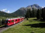 Zwischen den Bahnhöfen Morteratsch und Surovas ist R 1656 von Tirano kommend am 19.08.2012 unterwegs nach St. Moritz.