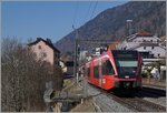Der SBB RABe 526 280 verlässt als Regionalzug 7114, unterwegs von Biel/Bienne nach La Chaux-de Fonds den Bahnhof St-Imier.
18. März 2016