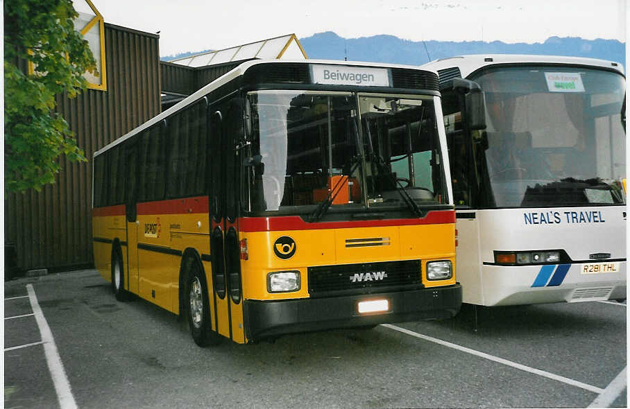 (047'603) - AVG Meiringen - Nr. 66/BE 403'166 - NAW/Hess (ex P 24'452) am 4. Juli 2001 beim Bahnhof Wilderswil