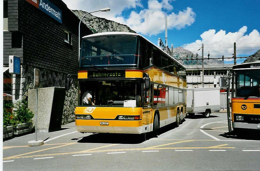 (048'715) - Thepra, Stans - Nr. 12/NW 5107 - Neoplan am 23. Juli 2001 beim Bahnhof Andermatt