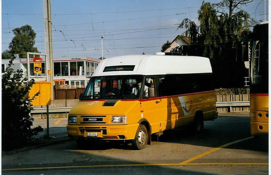 (050'231) - Stucki, Porrentruy - Nr. 24/JU 1924 - Iveco am 16. Oktober 2001 beim Bahnhof Porrentruy