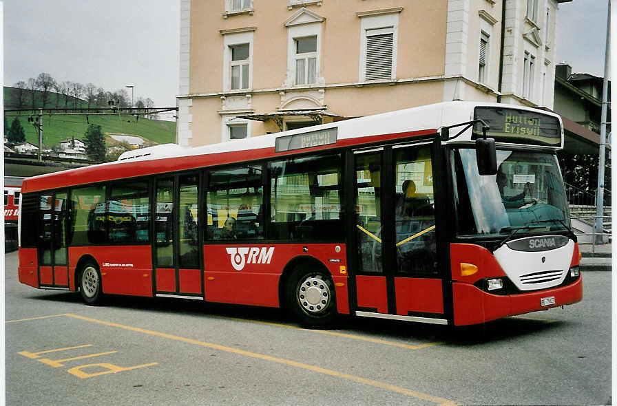 (052'925) - Lanz, Huttwil - BE 75'827 - Scania am 16. April 2002 beim Bahnhof Huttwil