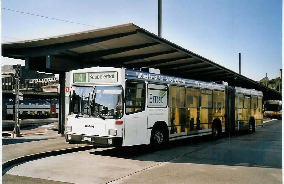 (061'612) - RVBW Wettingen - Nr. 120/AG 7173 - MAN/R&J am 19. Juli 2003 beim Bahnhof Baden