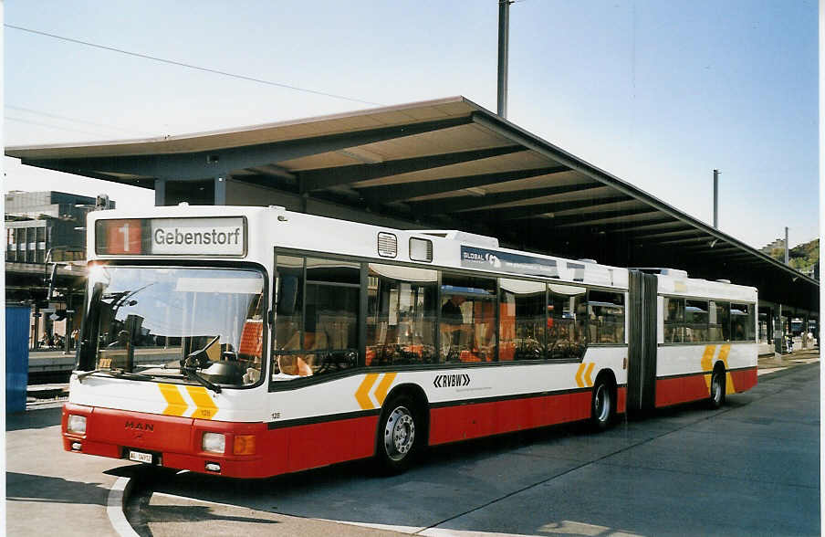 (061'618) - RVBW Wettingen - Nr. 128/AG 14'912 - MAN am 19. Juli 2003 beim Bahnhof Baden