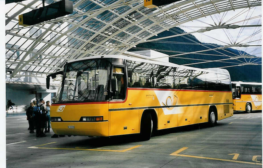 (062'210) - PostAuto Graubnden - GR 102'389 - Neoplan (ex P 25'856) am 29. Juli 2003 in Chur, Postautostation