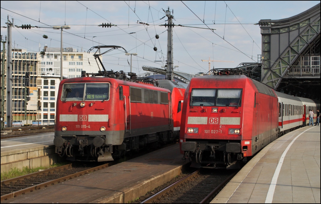 111 015 mit RE 9 nach Aachen Hbf und 101 027 am 17.04.11 in Kln Hbf