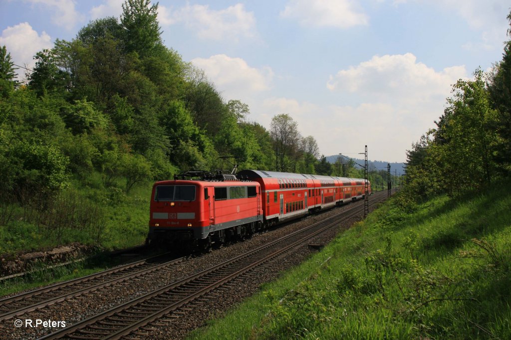 111 184-8 als RE4252 Mnchen - Nrnberg kurz vor Postbauer-Heng. 13.05.11