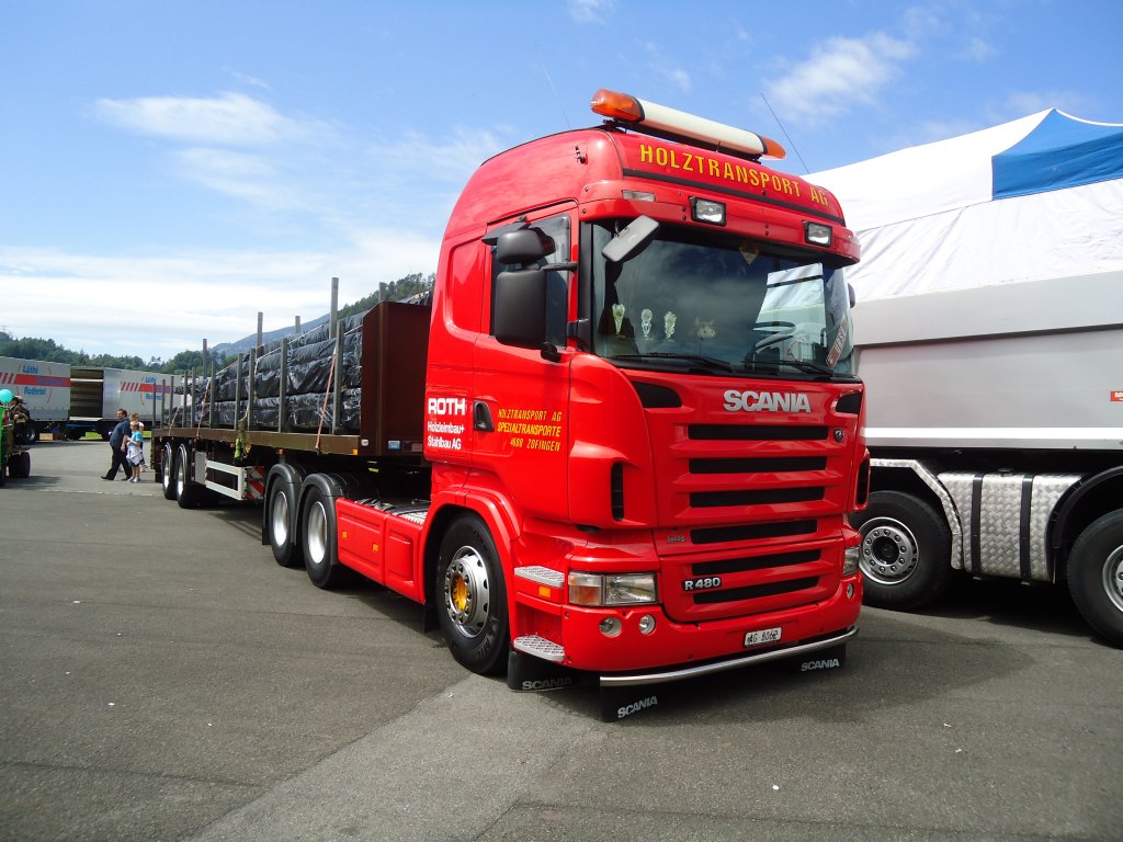 (134'360) - Holztransport, Zofingen - AG 8062 - Scania am 25. Juni 2011 in Interlaken, Flugplatz