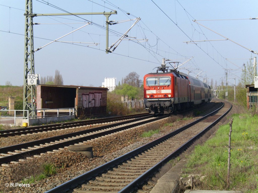 143 928-0 fuhr mit der S10 in Schkeuditz ein. 25.04.10