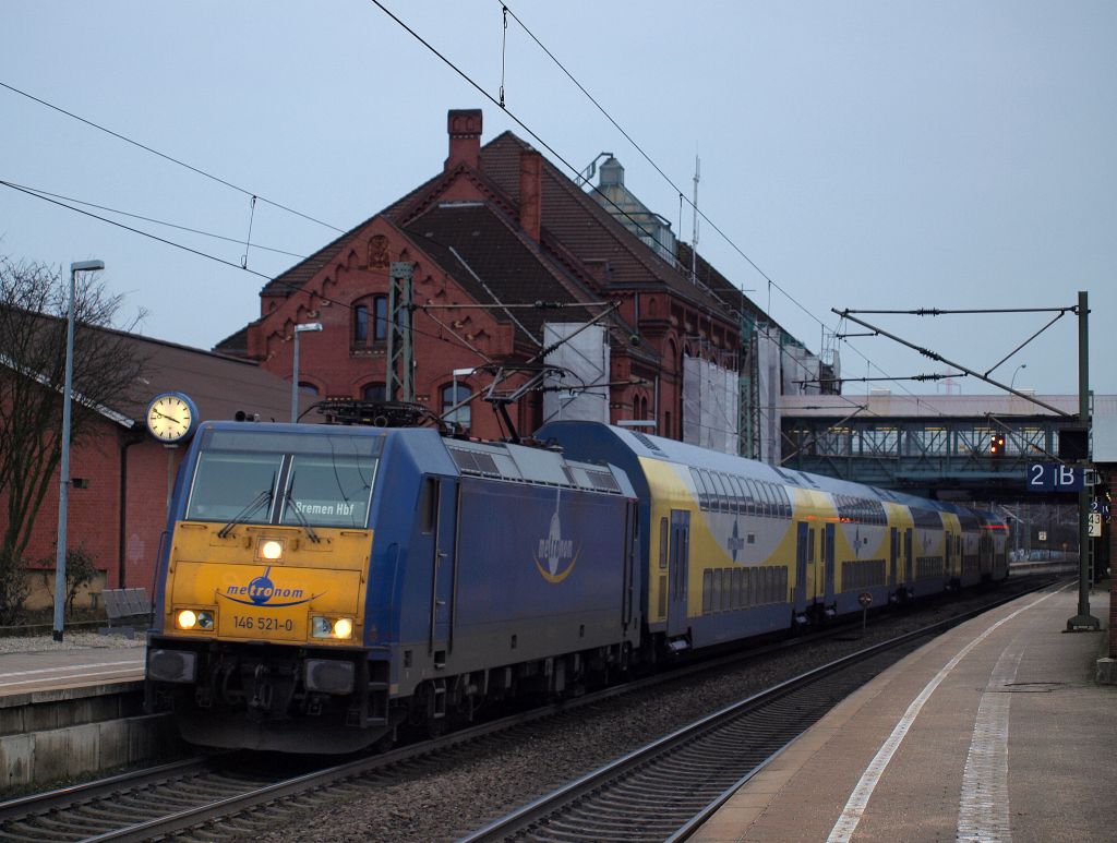 146 521-0 fuhr mit dem ME'R nach Bremen aus dem Bahnhof Hamburg-Harburg am 15.1