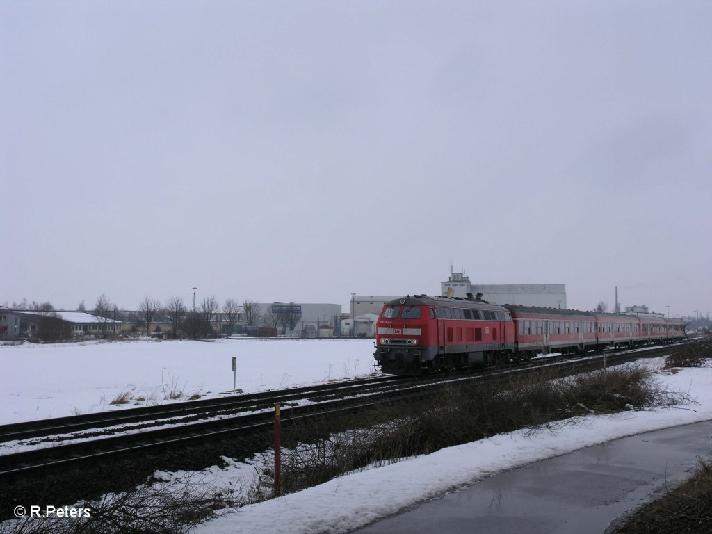 218 464-6 verlsst Buchloe mit der RE32606 Biessenhofen. 27.02.09
