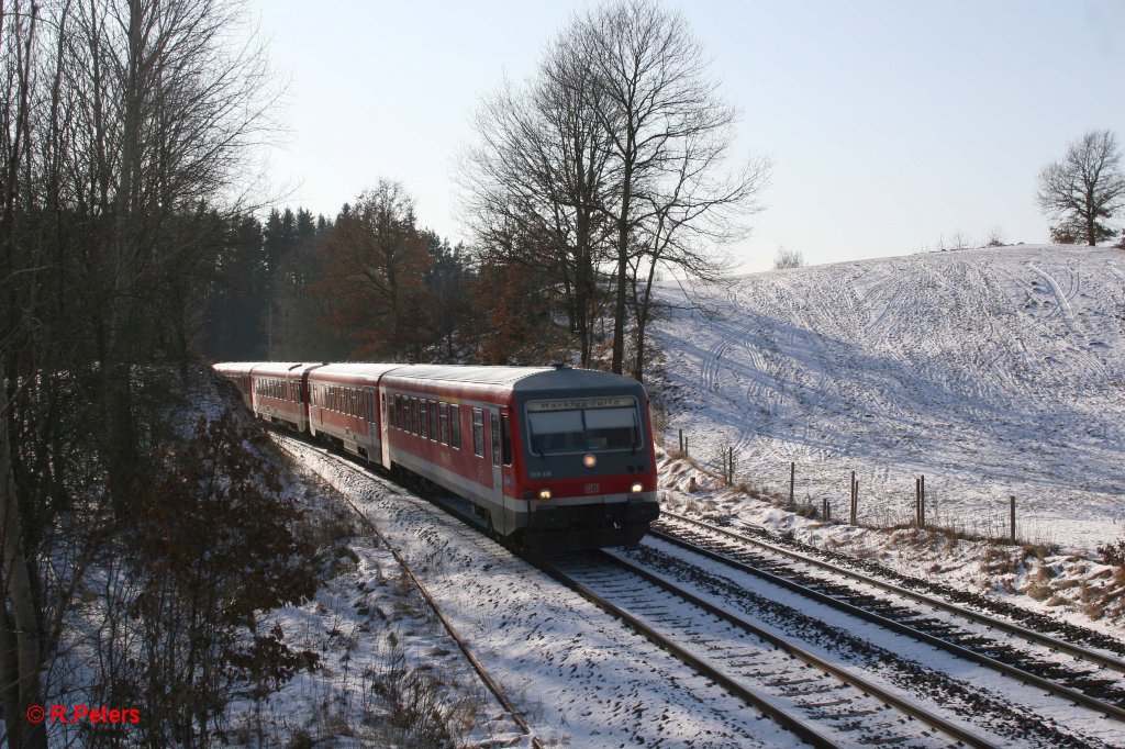 628 415-2 als RE 59796 Schlerverstrkungszug bei Reuth bei Erbendorf. 03.02.12