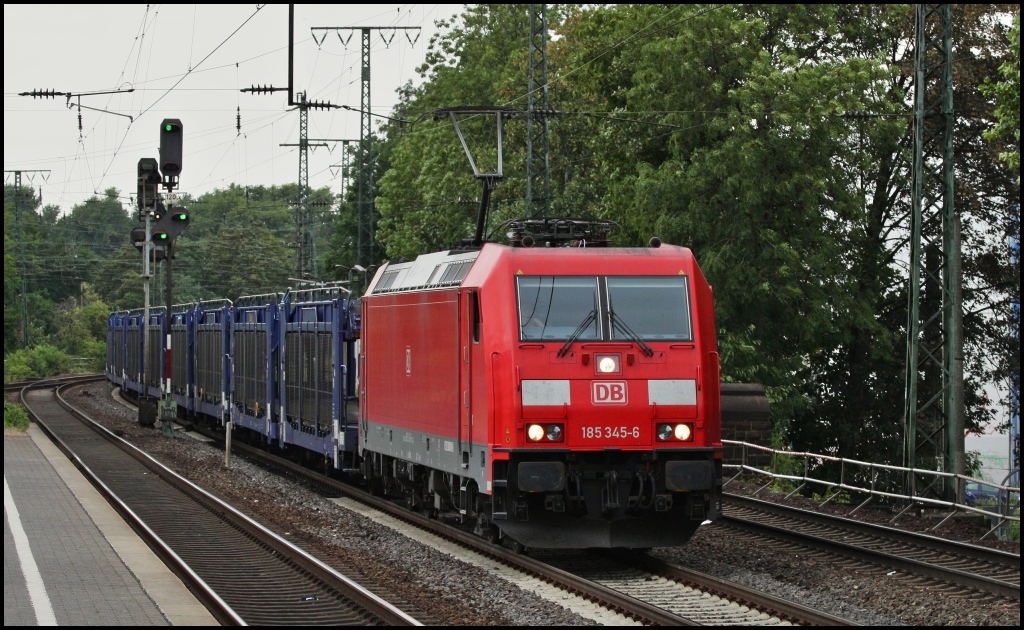 Am 16.07.12 durchfuhr 185 345 mit einem leeren Autozug Kln Sd in Richtung Sden