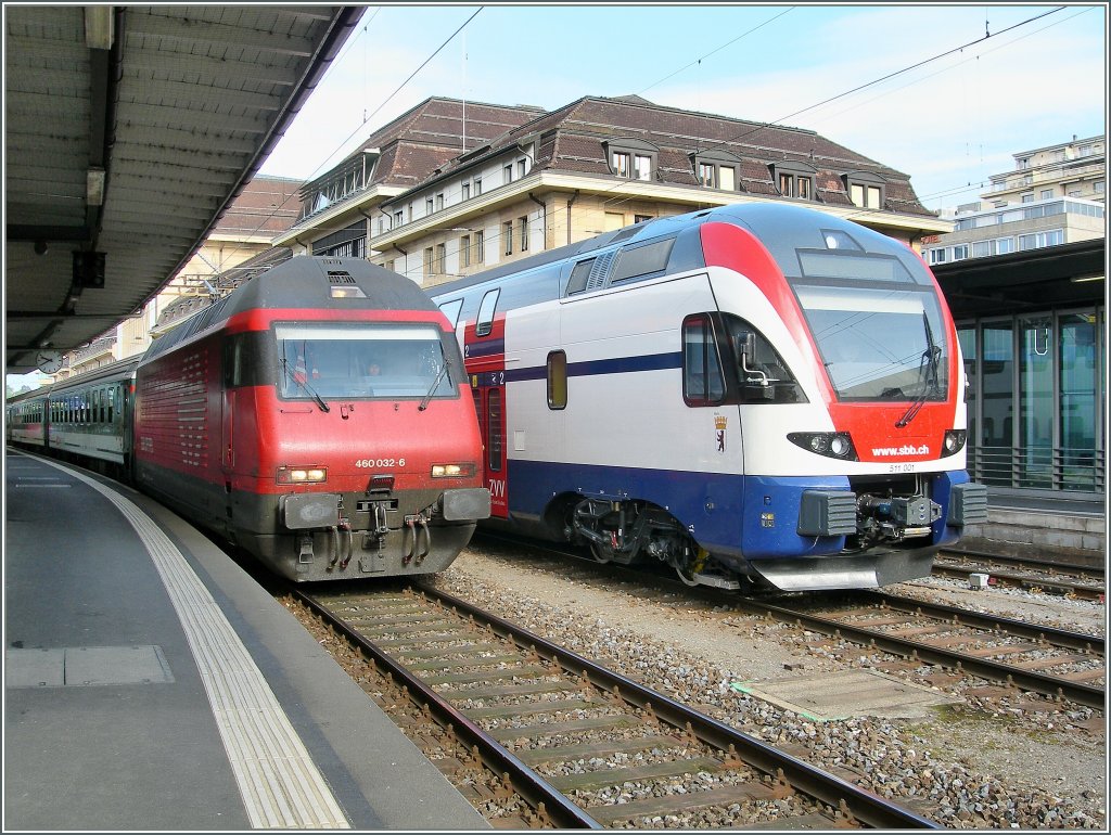 Auch heutte noch macht die doch schon einige Jahre alte Re 460 selbst neben dem neuen 511 eine guten Eindruck.
Re 460 032-6 mit IR nach Brig und 511 001 auf Testfahrt in Lausanne am 14. April 2011