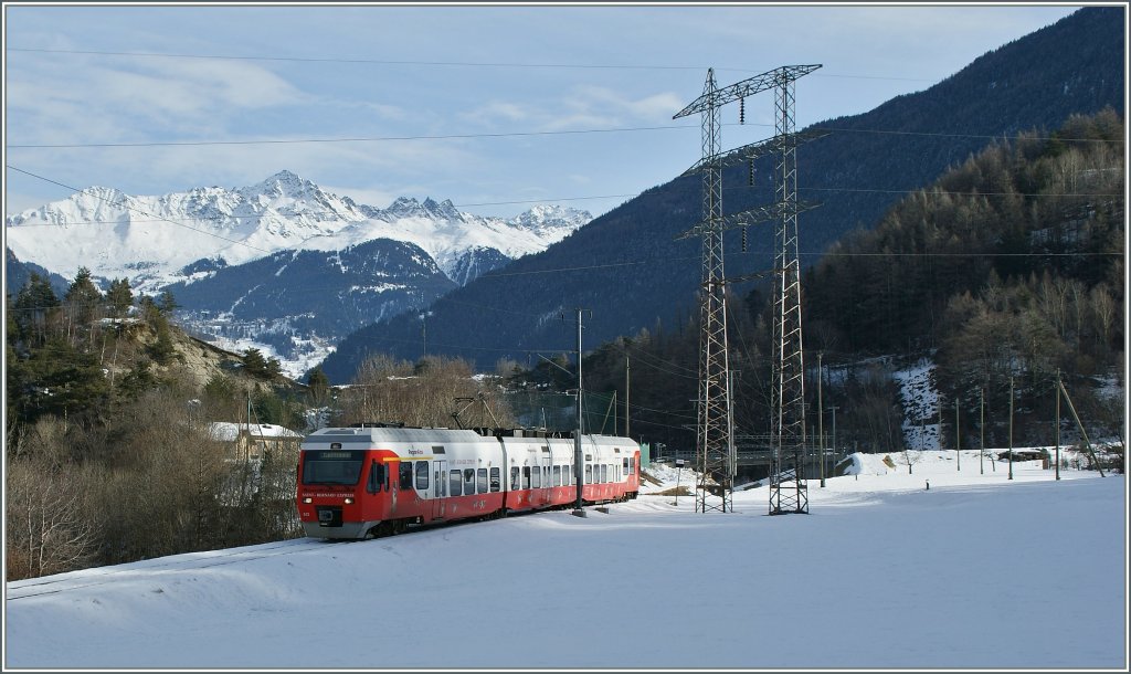 Der M-O (TMR/Region Alps) RABe 527 512-8 kurz nach Sembrancher auf dem Weg nach Martigny.
27. Jan. 2013