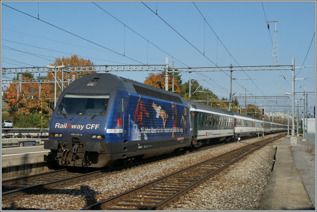 Die  RailAway  Re 460 050-8 mit einem IR in Morges.
21.10.2011