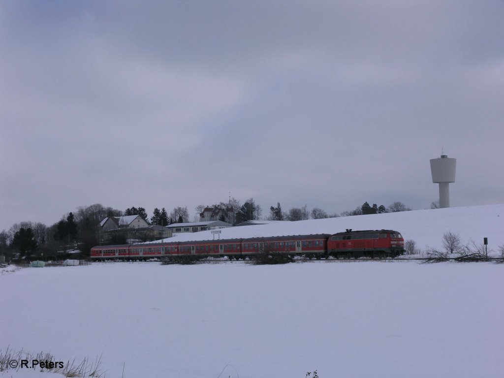 Eine 218er verlsst Buchloe mit einer RB Kempten. 25.02.09