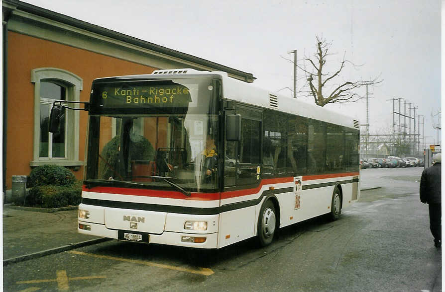 (082'127) - Geissmann, Hgglingen - AG 18'814 - MAN am 27. Dezember 2005 beim Bahnhof Wohlen