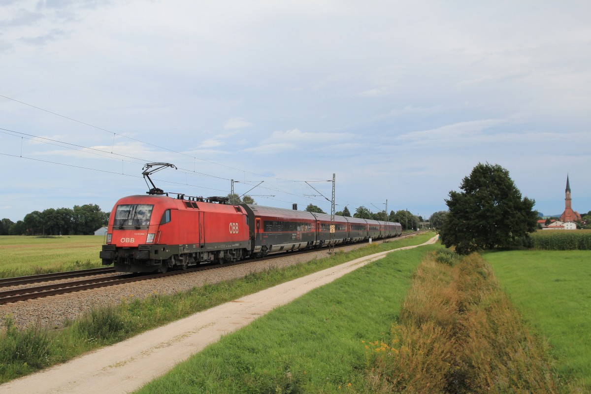 1116 042-1 nochmals mit einem  Railjet , diesmal am 15. August 2014 bei bersee am Chiemsee.