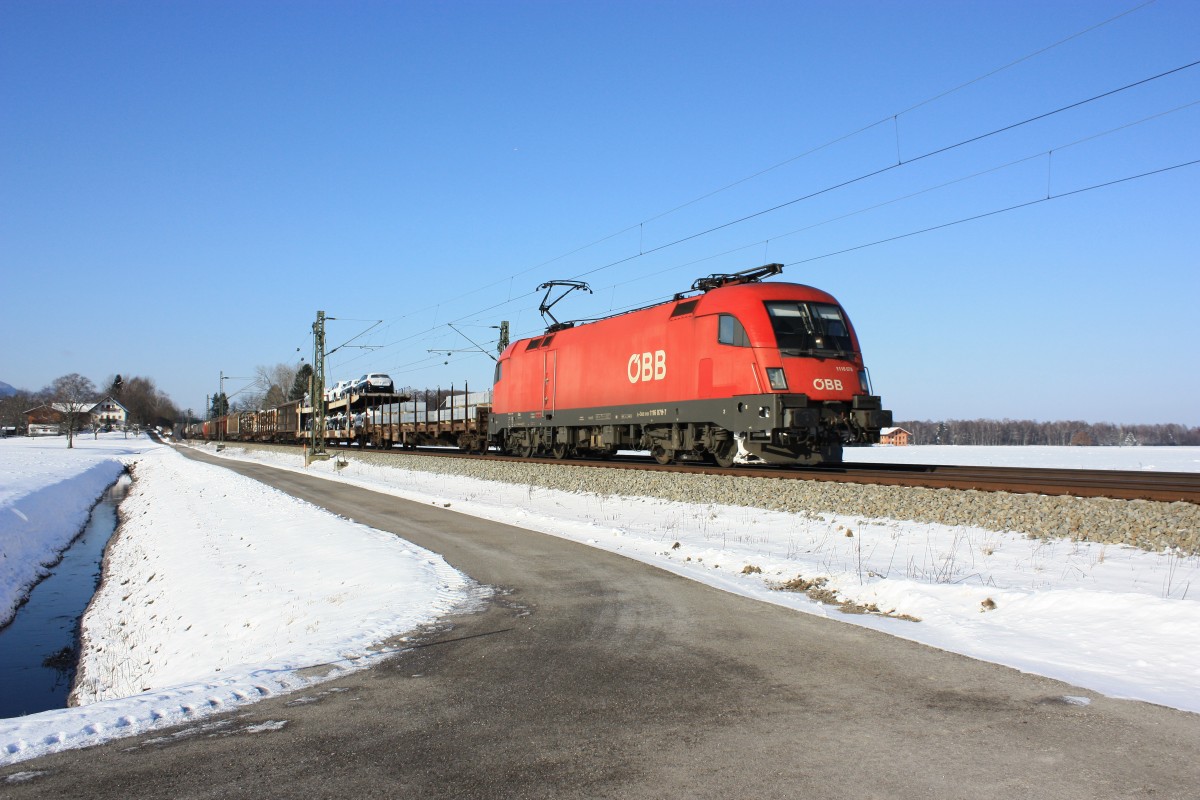 1116 078-7 mit einem gemischten Gterzug am 10. Februar 2013 bei bersee.