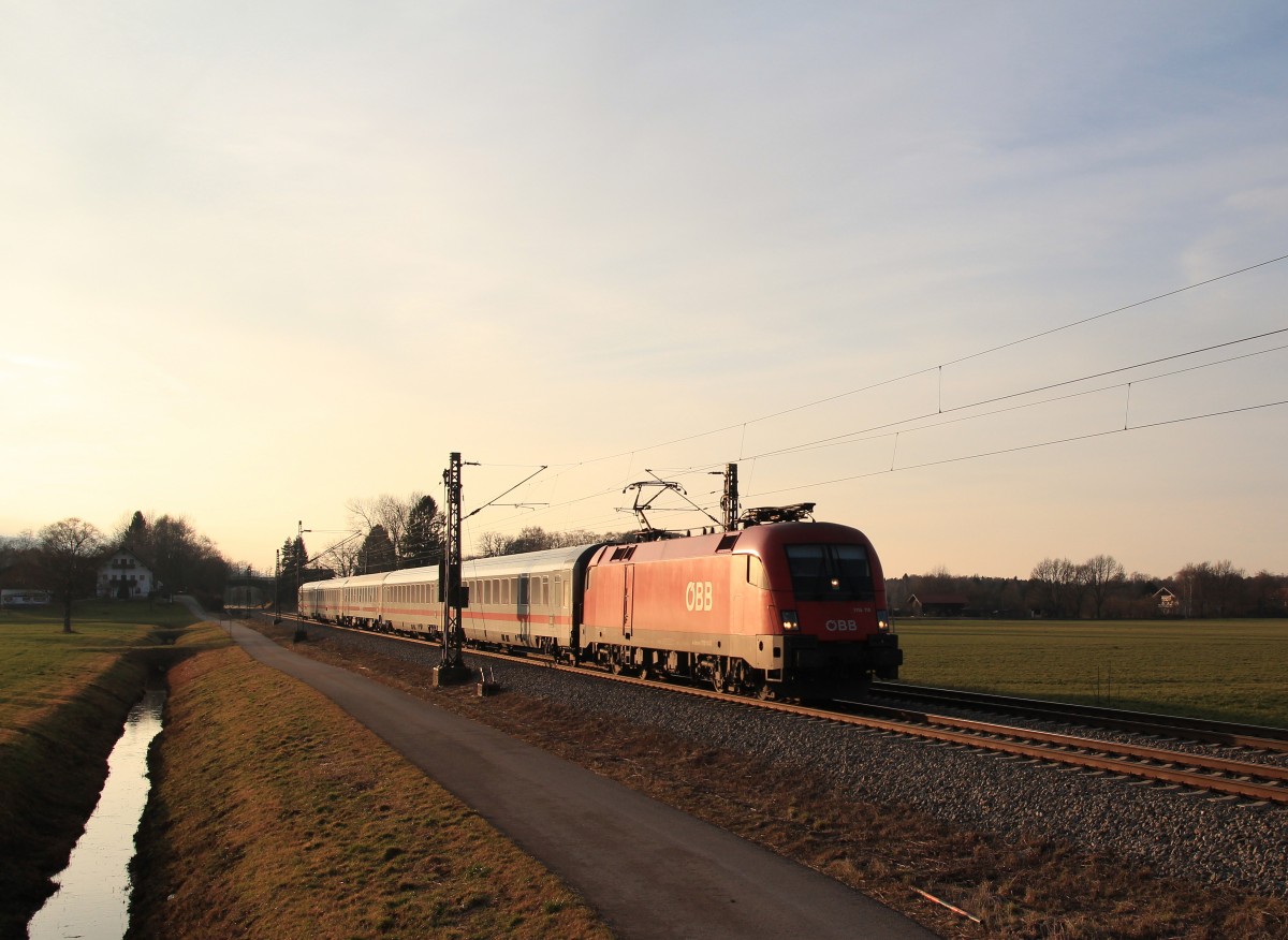 1116 114-0 am 12. Januar 2014 mit dem  IC Knigssee  bei bersee am Chiemsee.