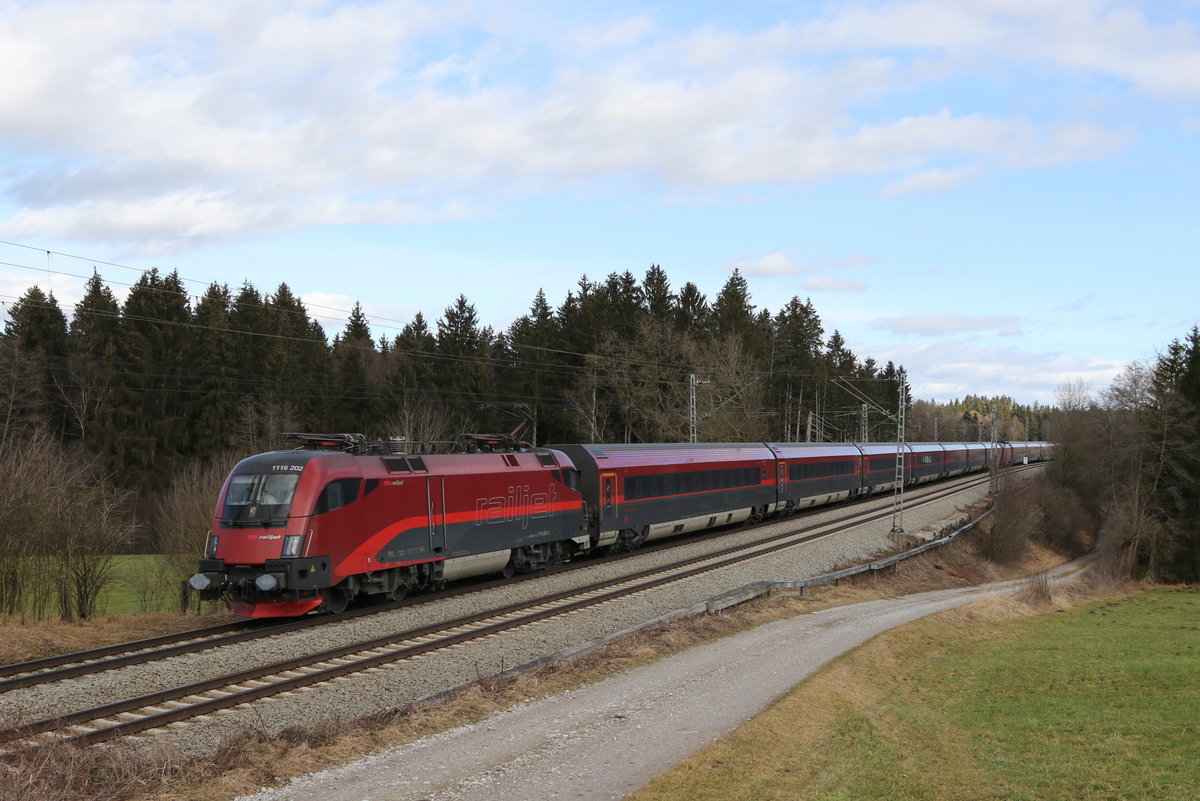 1116 202 mit einem Railjet aus Salzburg kommend am 4. Februar 2021 bei Grabensttt.