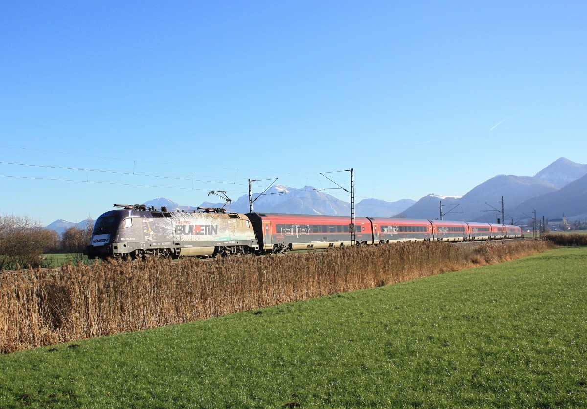1116 222  RED Bulletin  an der Zugspitze eines Railjets auf dem Weg nach München.
Aufgenommen am 2. Dezember 2013 bei Bernau am Chiemsee.