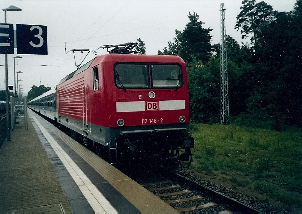 112 148 mit einem InterRegio in Binz.