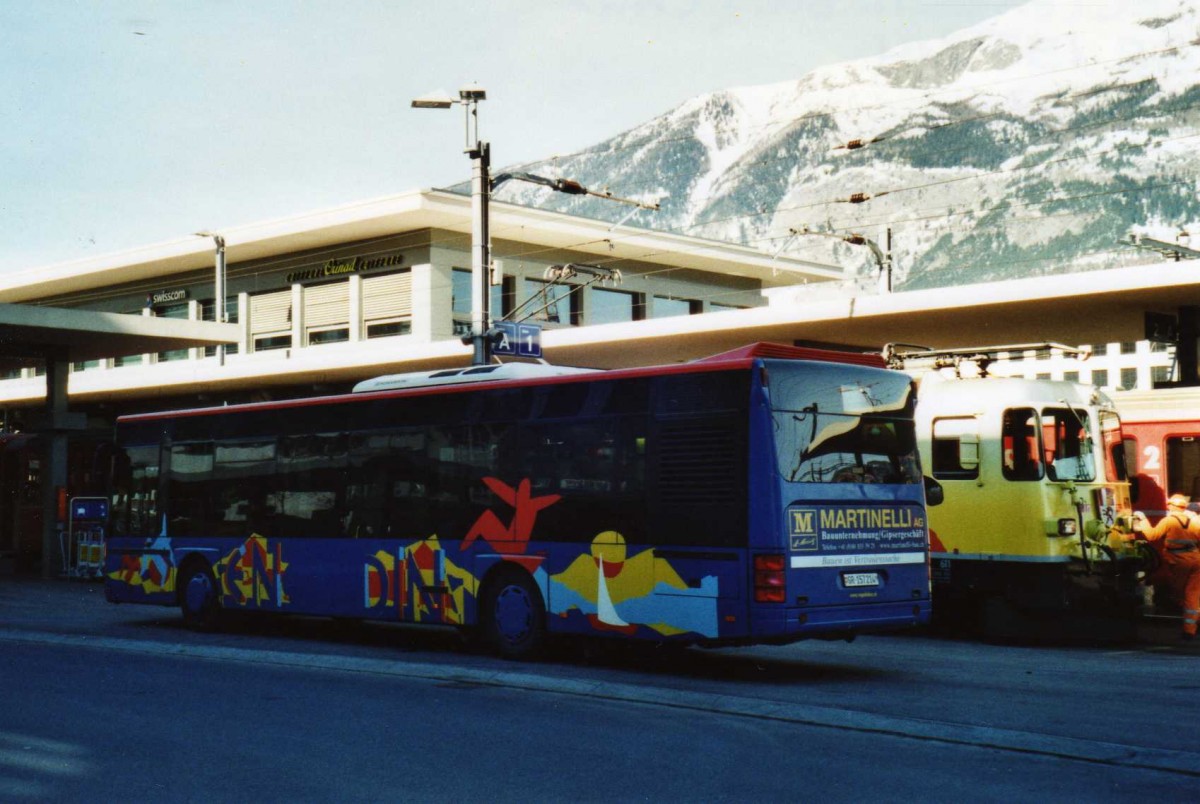 (115'035) - SBC Chur - Nr. 214/GR 157'214 - Neoplan am 14. Mrz 2009 beim Bahnhof Chur