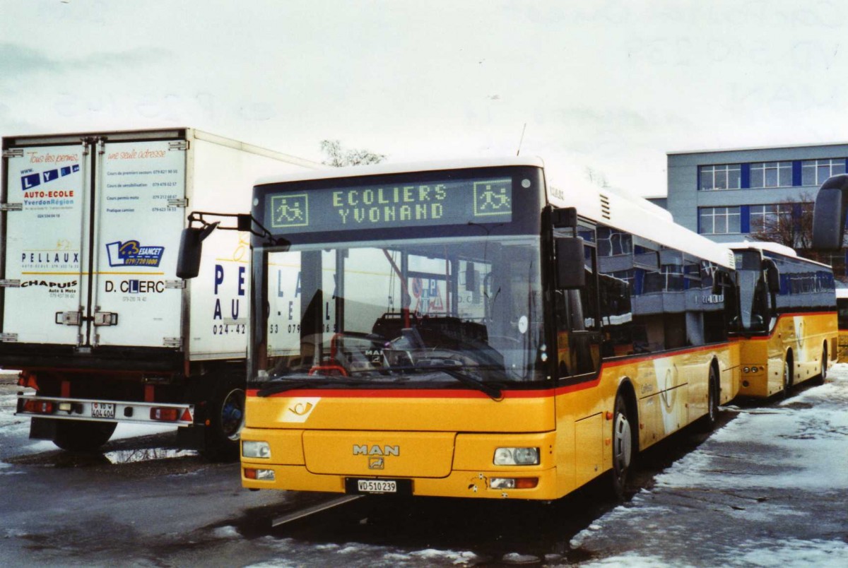 (123'317) - CarPostal Ouest - VD 510'239 - MAN (ex P 25'145) am 23. Dezember 2009 in Yverdon, Garage