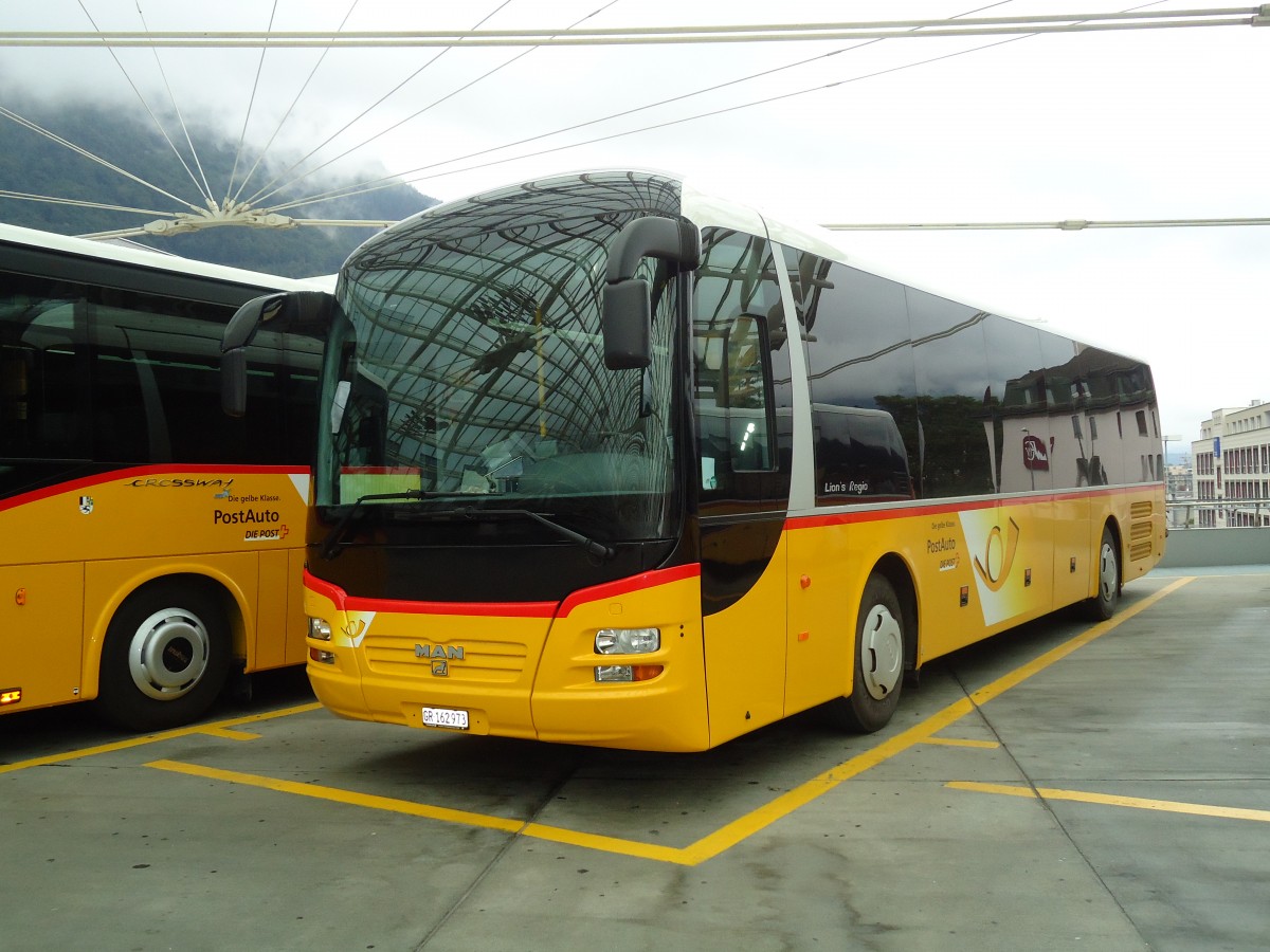 (128'700) - PostAuto Graubnden - GR 162'973 - MAN am 13. August 2010 in Chur, Postautostation