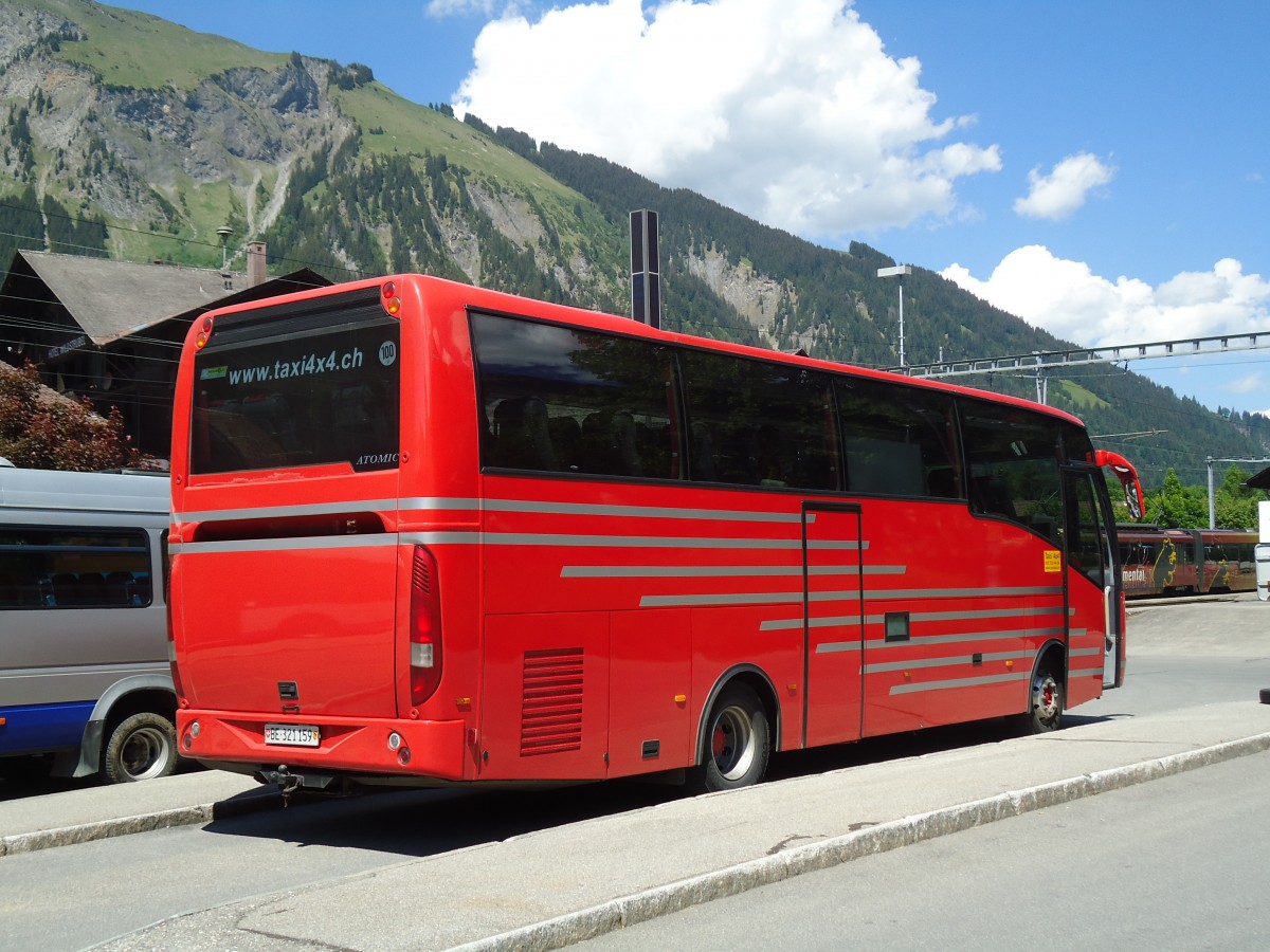 (133'922) - Ueltschi, Zweisimmen (AFA) - BE 321'159 - MAN/Atomic am 30. Mai 2011 beim Bahnhof Lenk