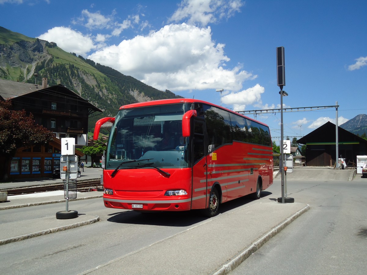 (133'929) - Ueltschi, Zweisimmen (AFA) - BE 321'159 - MAN/Atomic am 30. Mai 2011 beim Bahnhof Lenk