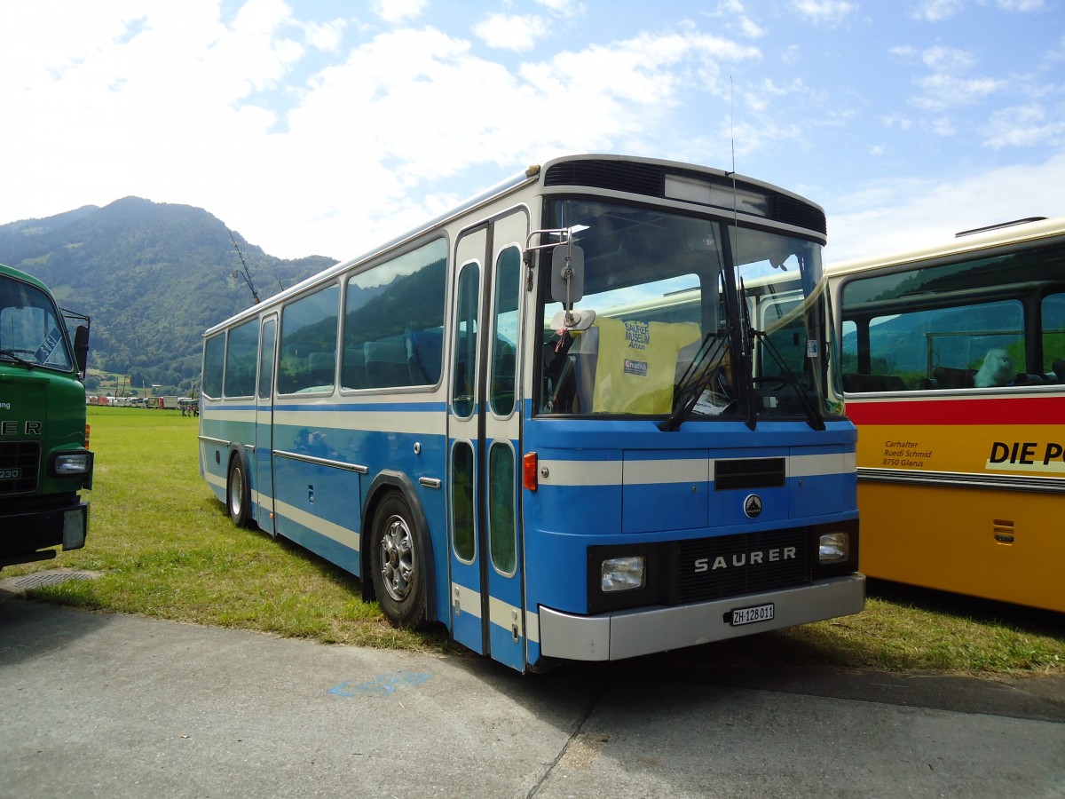 (134'402) - Mantel, Elgg - ZH 128'011 - Saurer/Tscher (ex LLB Susten Nr. 12) am 25. Juni 2011 in Interlaken, Flugplatz