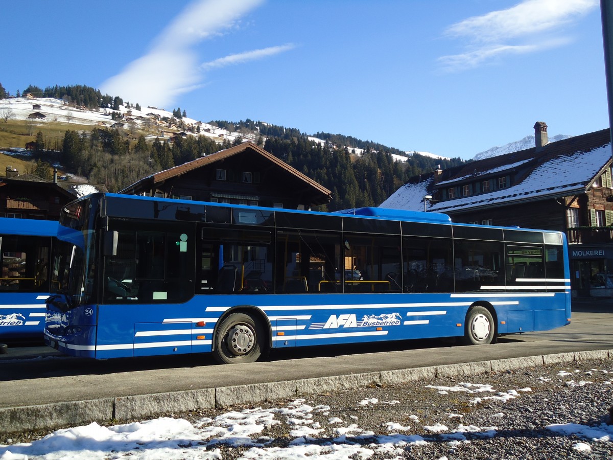 (137'164) - AFA Adelboden - Nr. 54/BE 611'056 - Neoplan (ex VBZ Zrich Nr. 243) am 11. Dezember 2011 beim Bahnhof Lenk