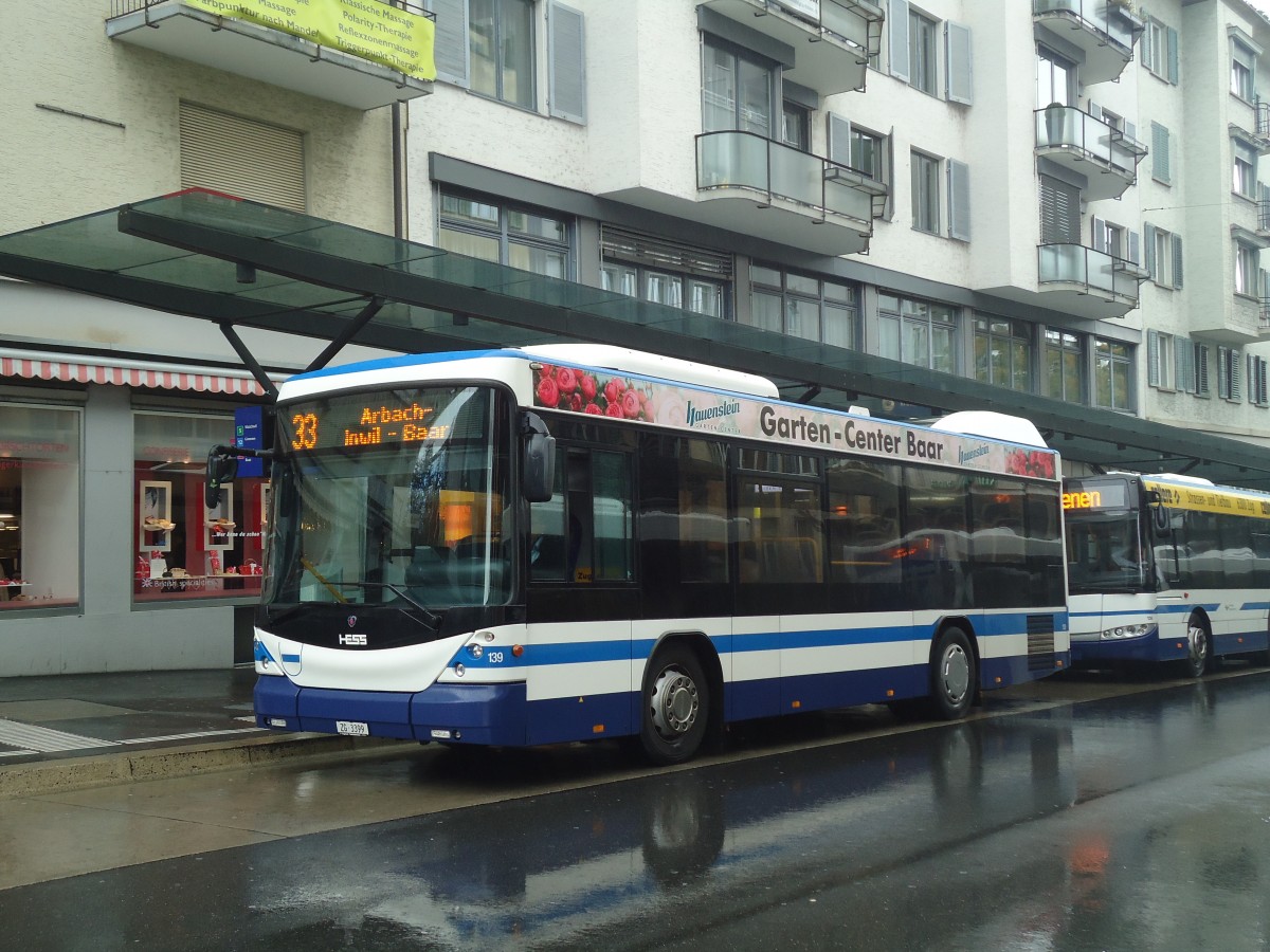 (141'410) - ZVB Zug - Nr. 139/ZG 3399 - Scania/Hess am 1. September 2012 beim Bahnhof Zug