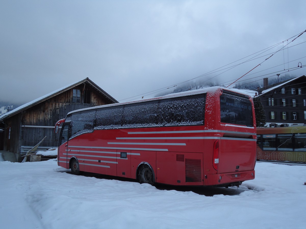 (142'895) - Ueltschi, Zweisimmen (AFA) - MAN/Atomic am 2. Januar 2013 beim Bahnhof Lenk