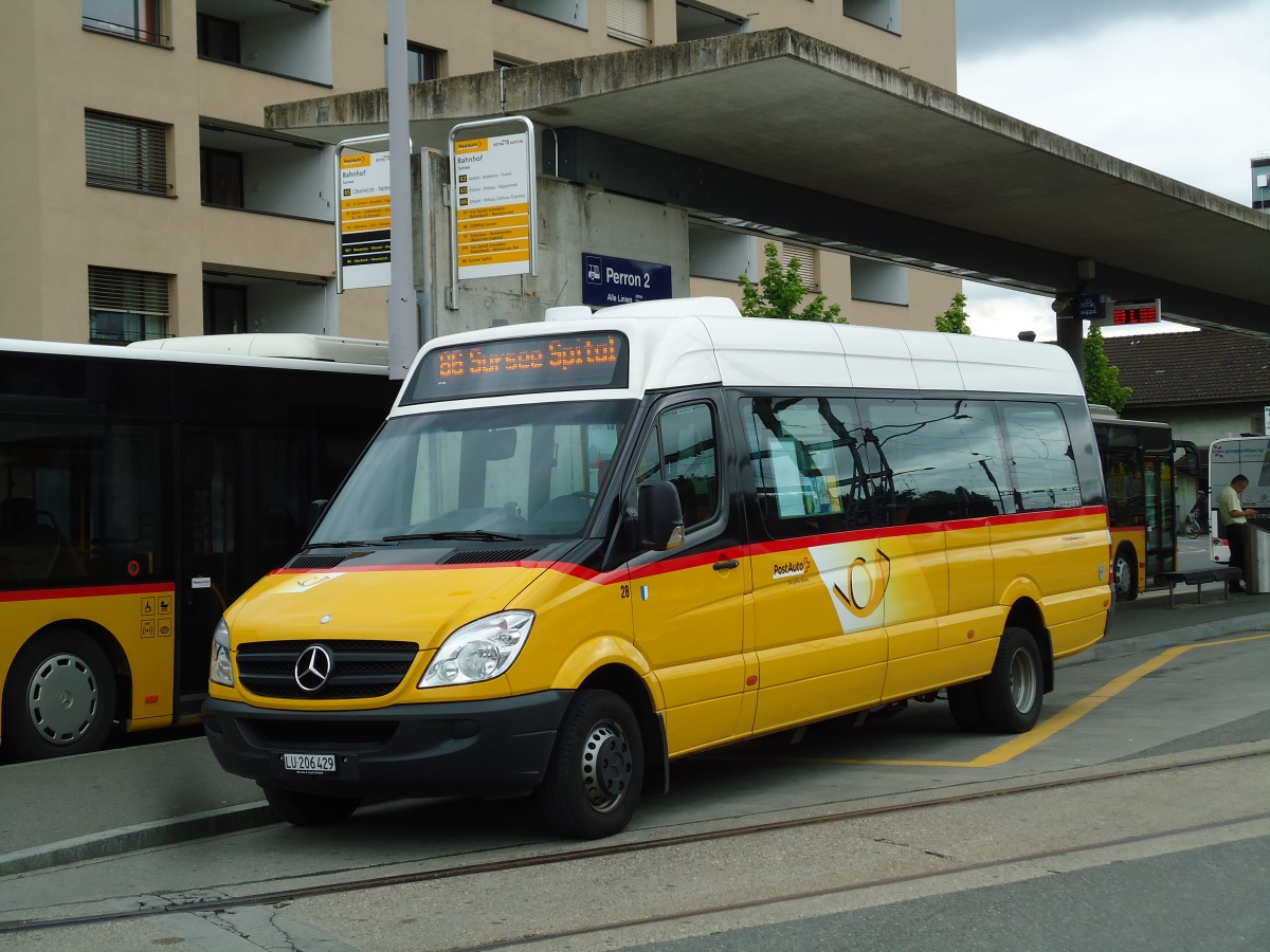 (144'935) - Hfliger, Sursee - Nr. 28/LU 206'429 - Mercedes am 10. Juni 2013 beim Bahnhof Sursee